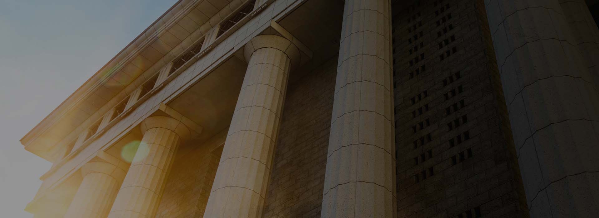 Courthouse columns with sunlight