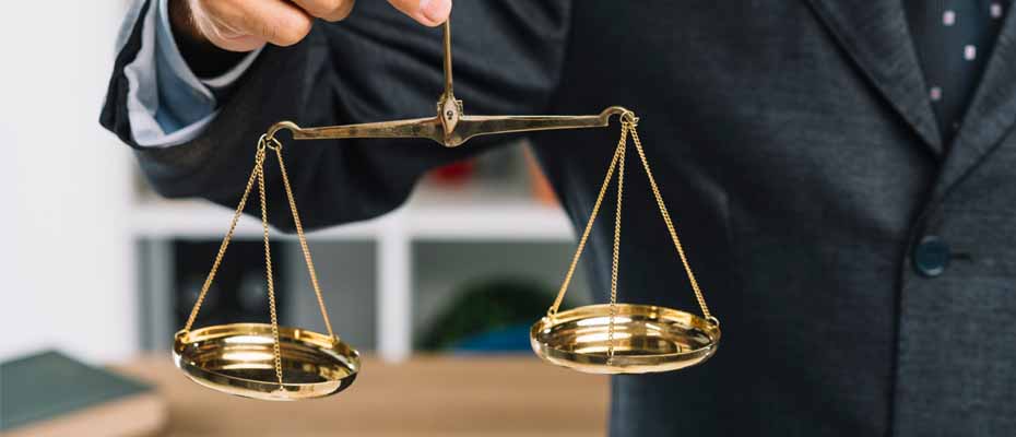 Lawyer holding a scale of justice