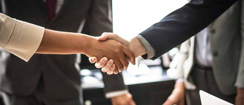 Professional handshake in a business setting